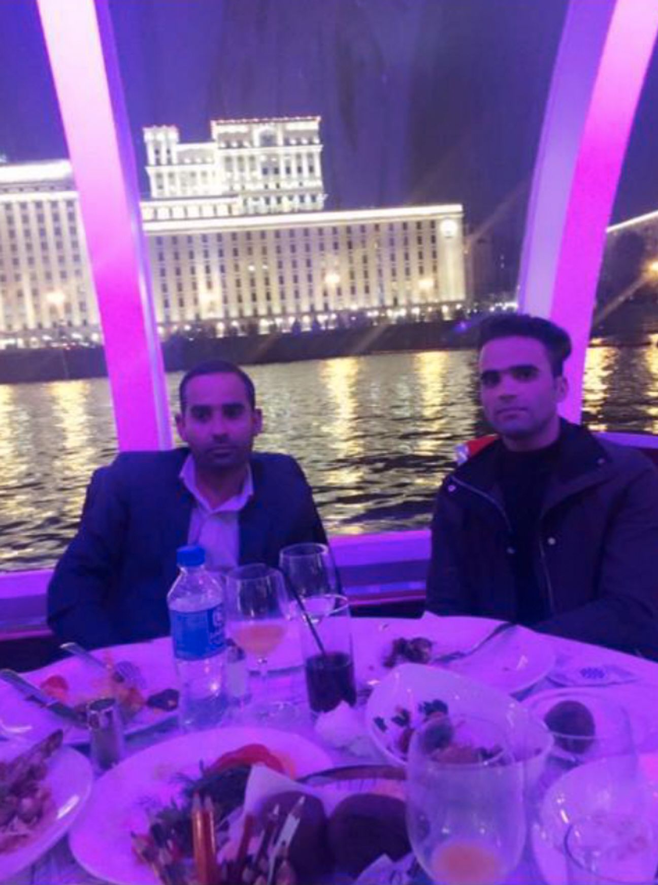 A photo of Rahmatullah Azizi, left, with his brother Hedayatullah Azizi, right, in a restaurant in Moscow across the river from The Russian Defense Ministry, which oversees the GRU. The photo was retrieved from Azizi’s Facebook page in 2019. 