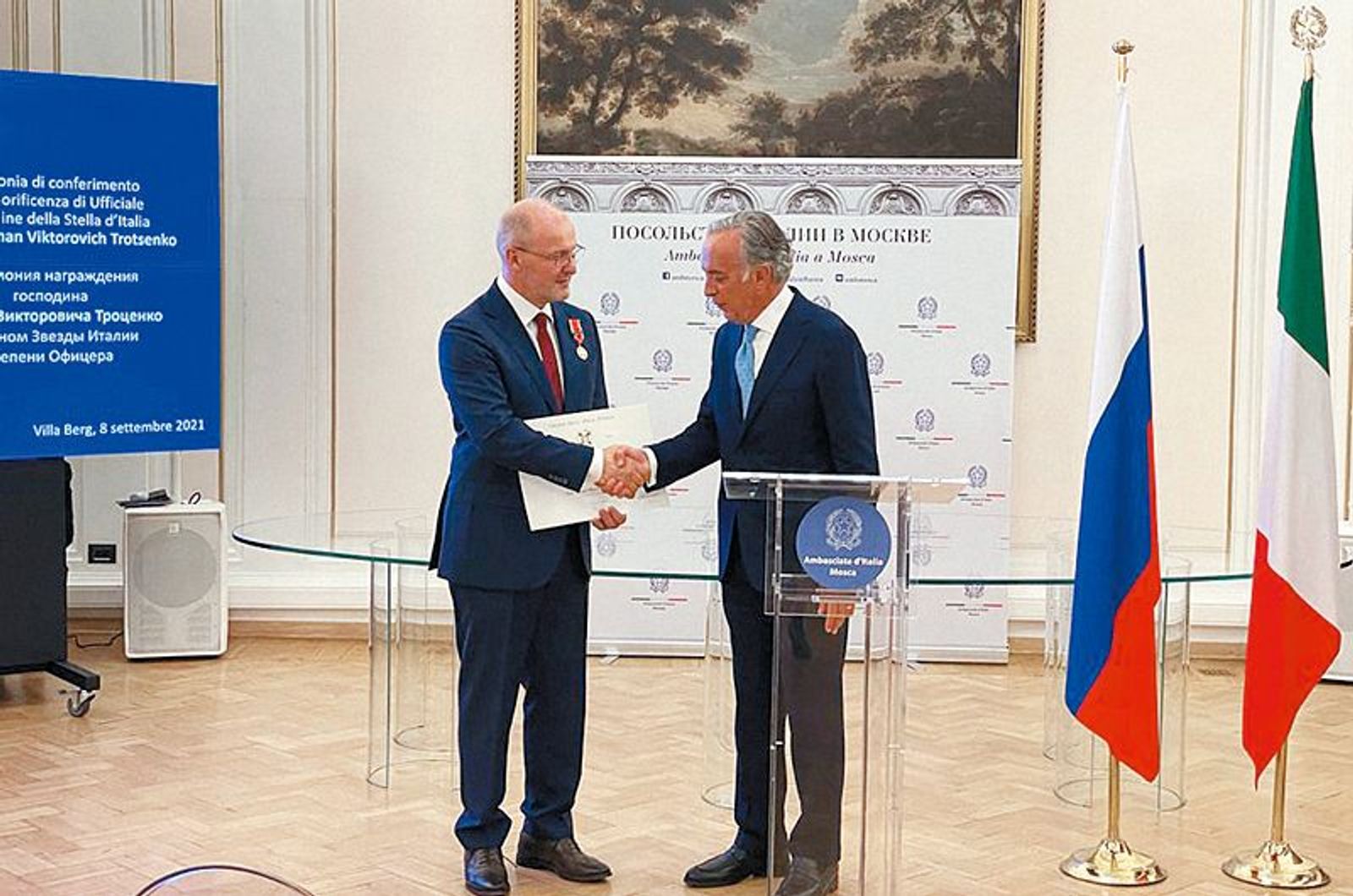 Roman Trotsenko (left) accepts the Order of the Star of Italy in 2021
